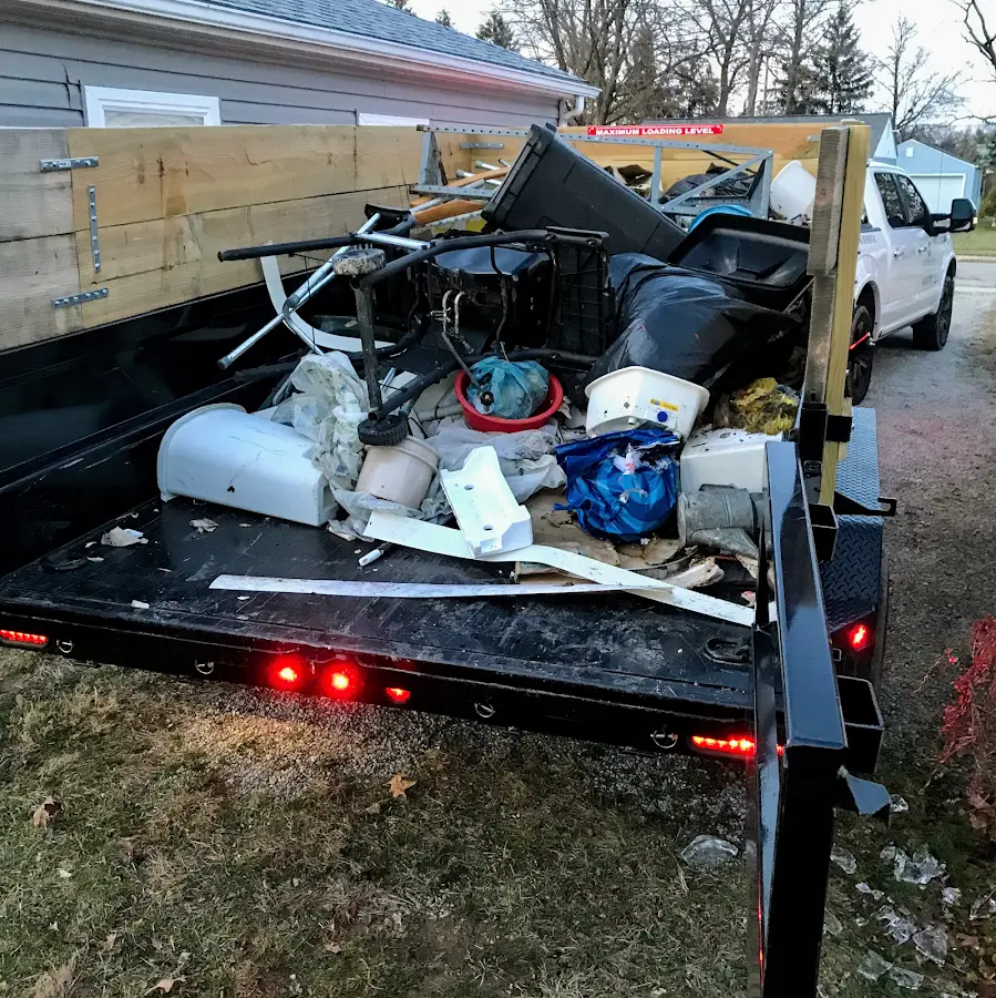 Roll-off dumpster delivered to a residential driveway in Fargo