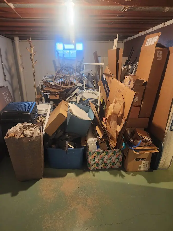 Roll-off dumpster container at job site for 15 Yard Dumpster Rental in Fargo